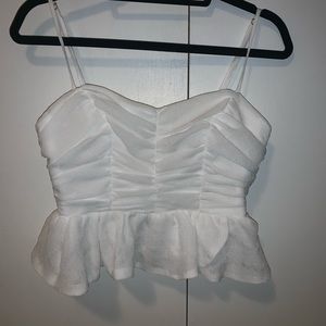 Saints + Secrets white crop top